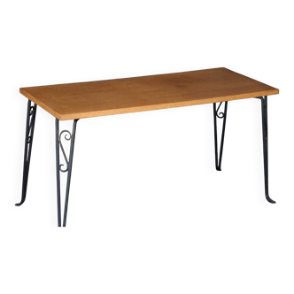 Beautiful vintage coffee table (1970s). Made of plywood and cast iron.