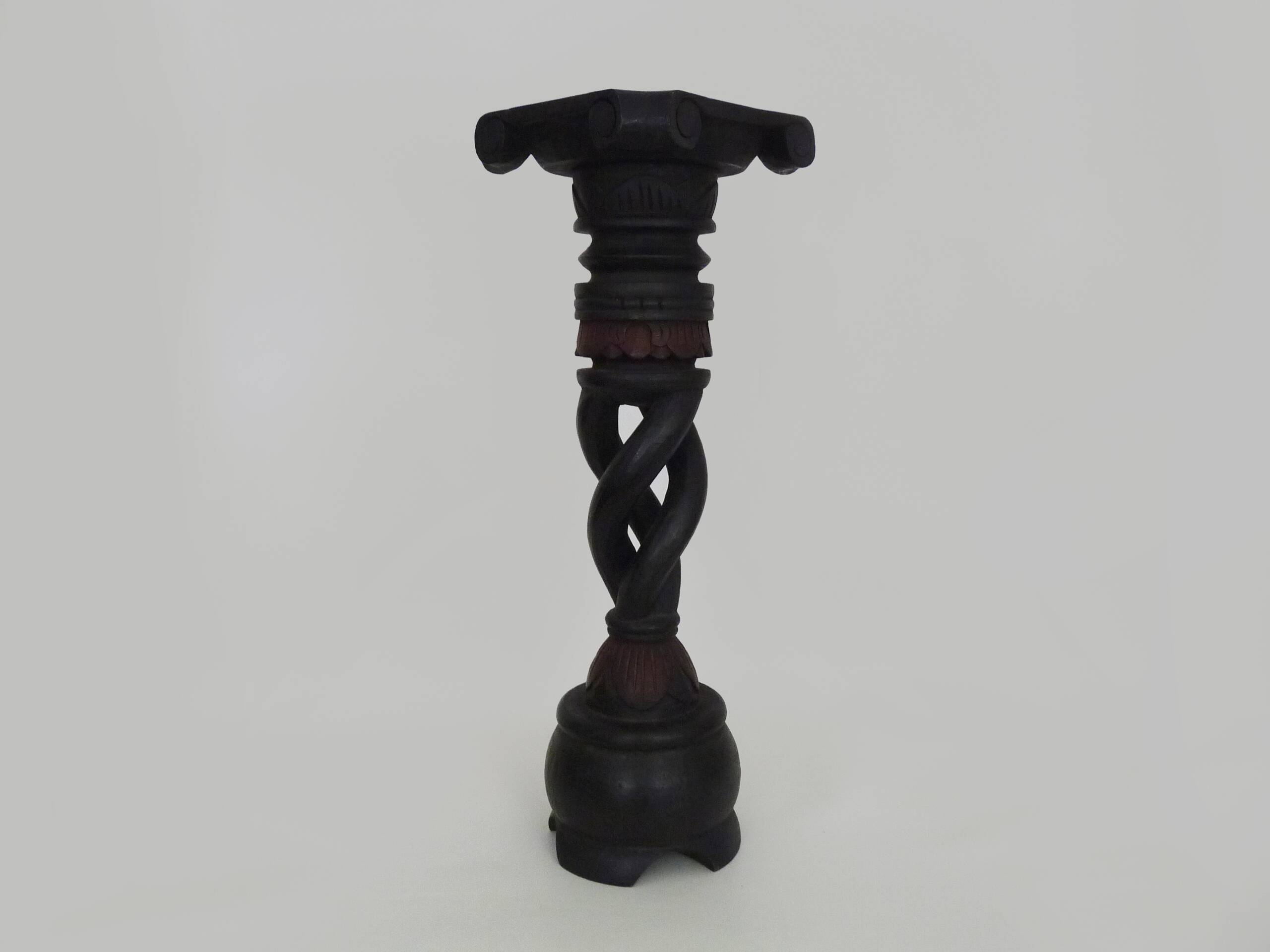Twisted and engraved blackened wooden pedestal. 1960s 70s.