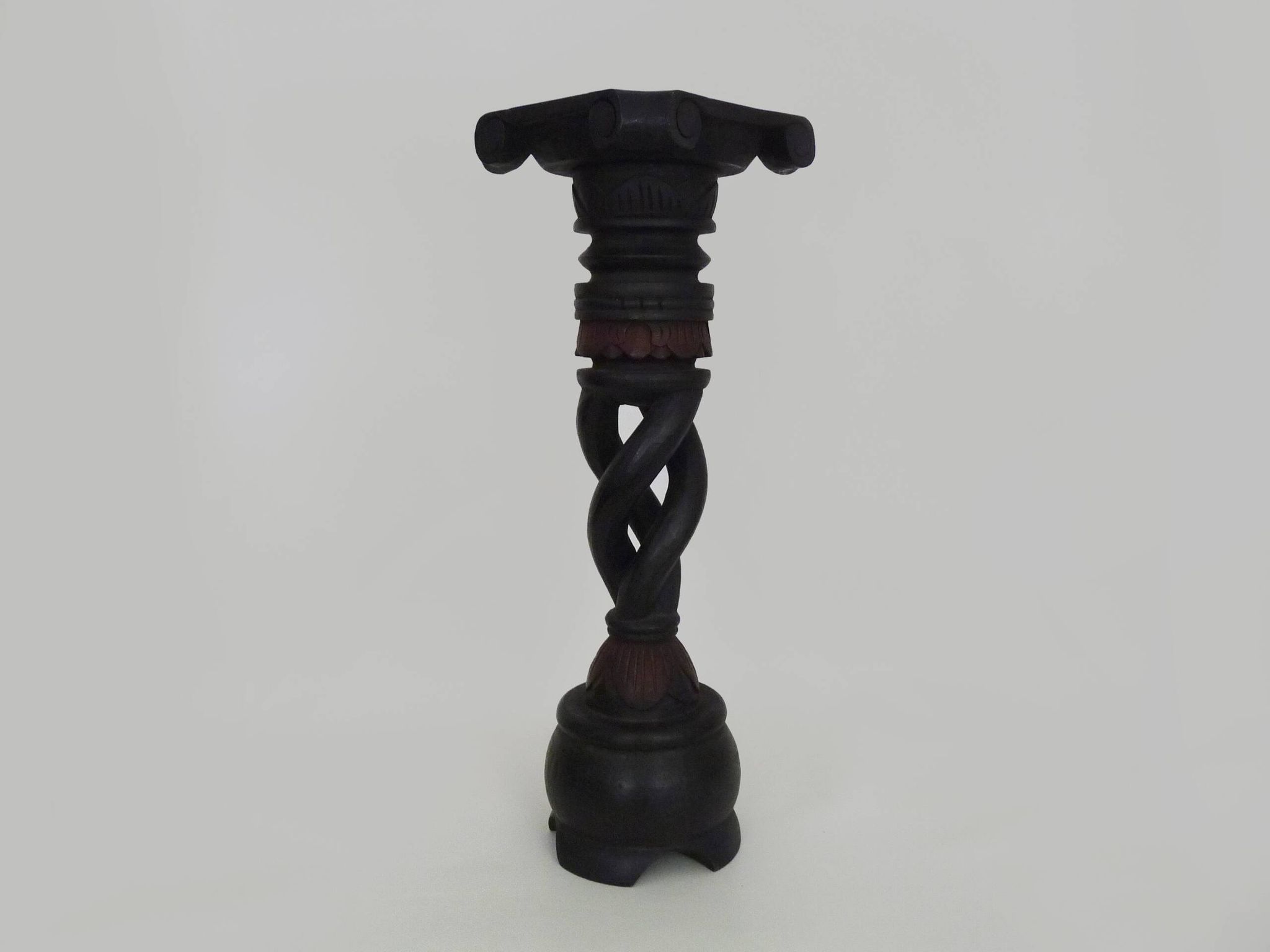 Twisted and engraved blackened wooden pedestal. 1960s 70s.