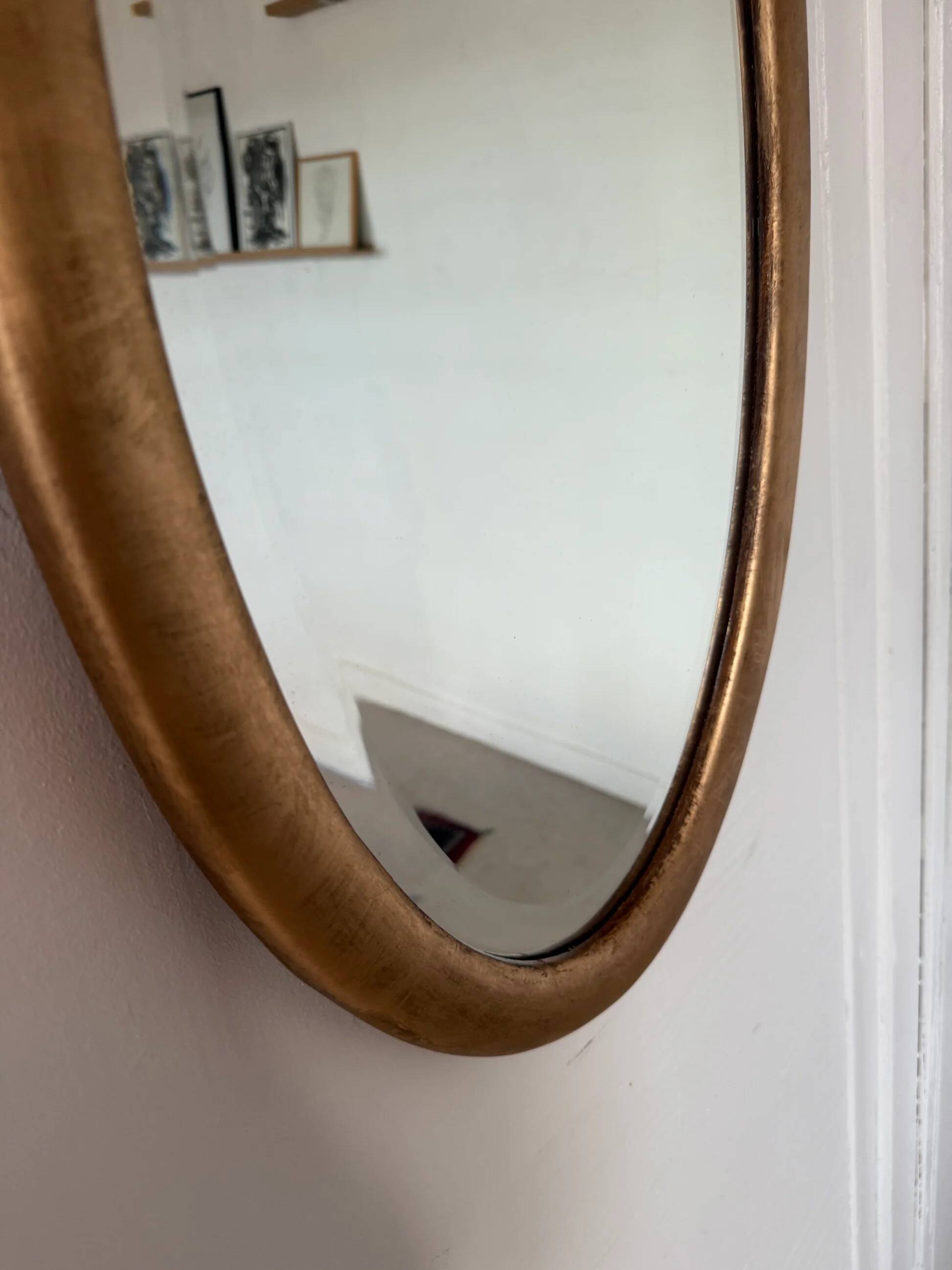 Miroir doré ovale ancien glace biseautée