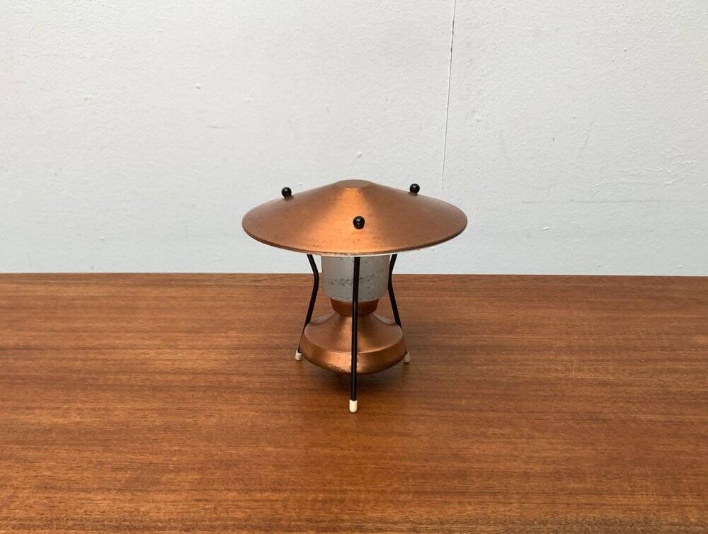 Small tripod table lamp in copper, 1950s.