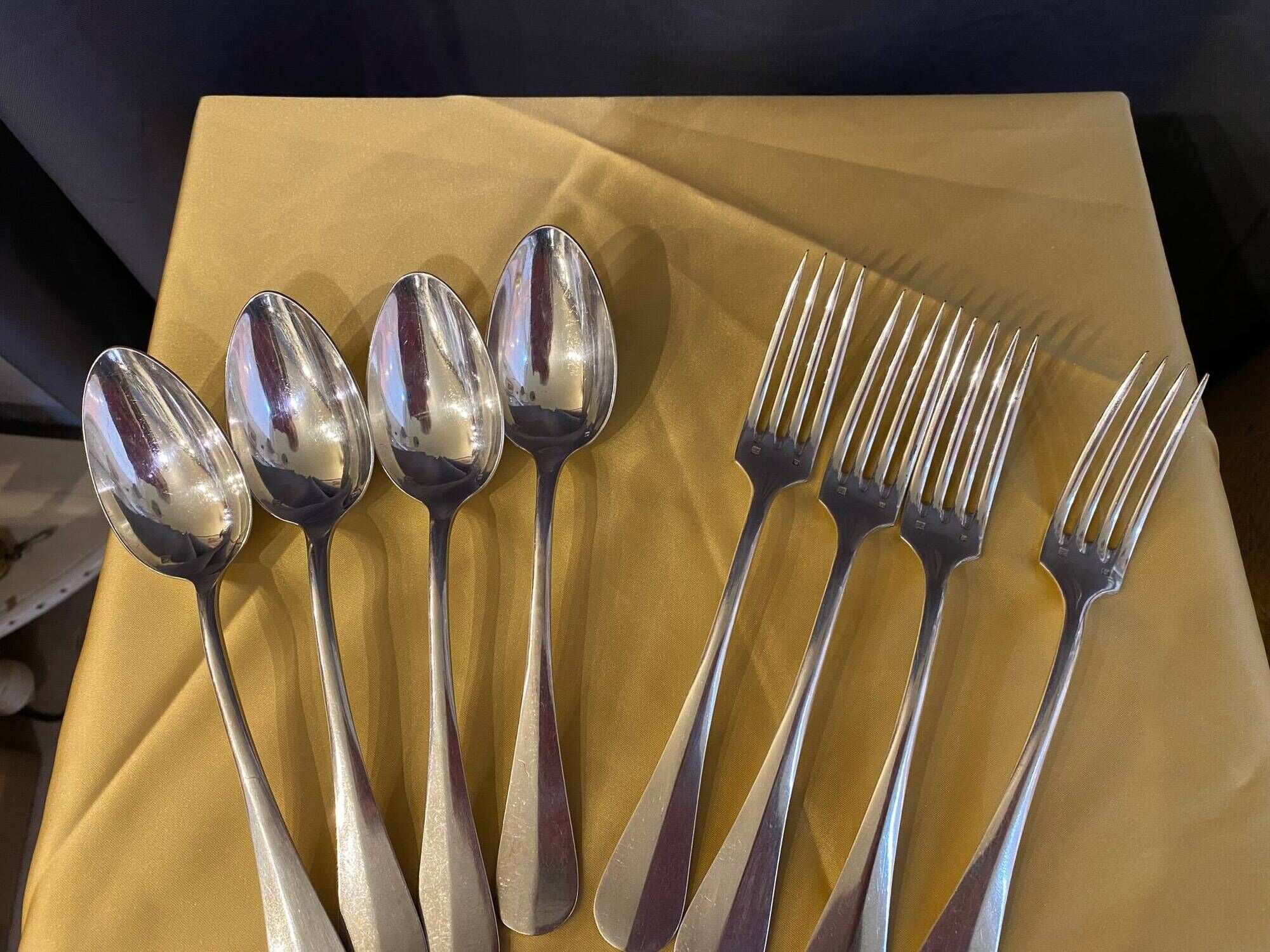 Series of 4 silver metal cutlery uniplat net model spoons forks