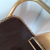 Rolling service in formica and gilded metal
