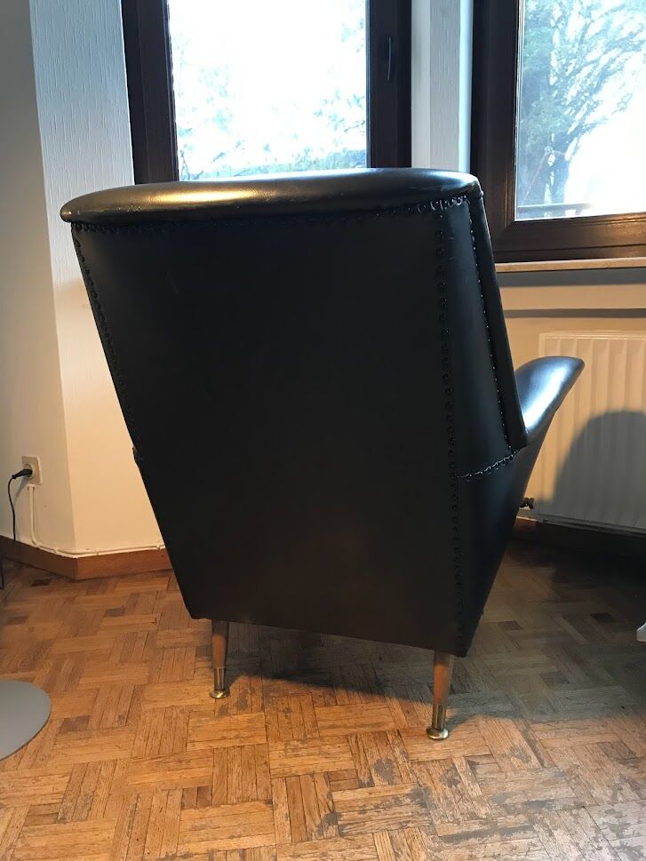Vintage 60's armchair in black skai.
