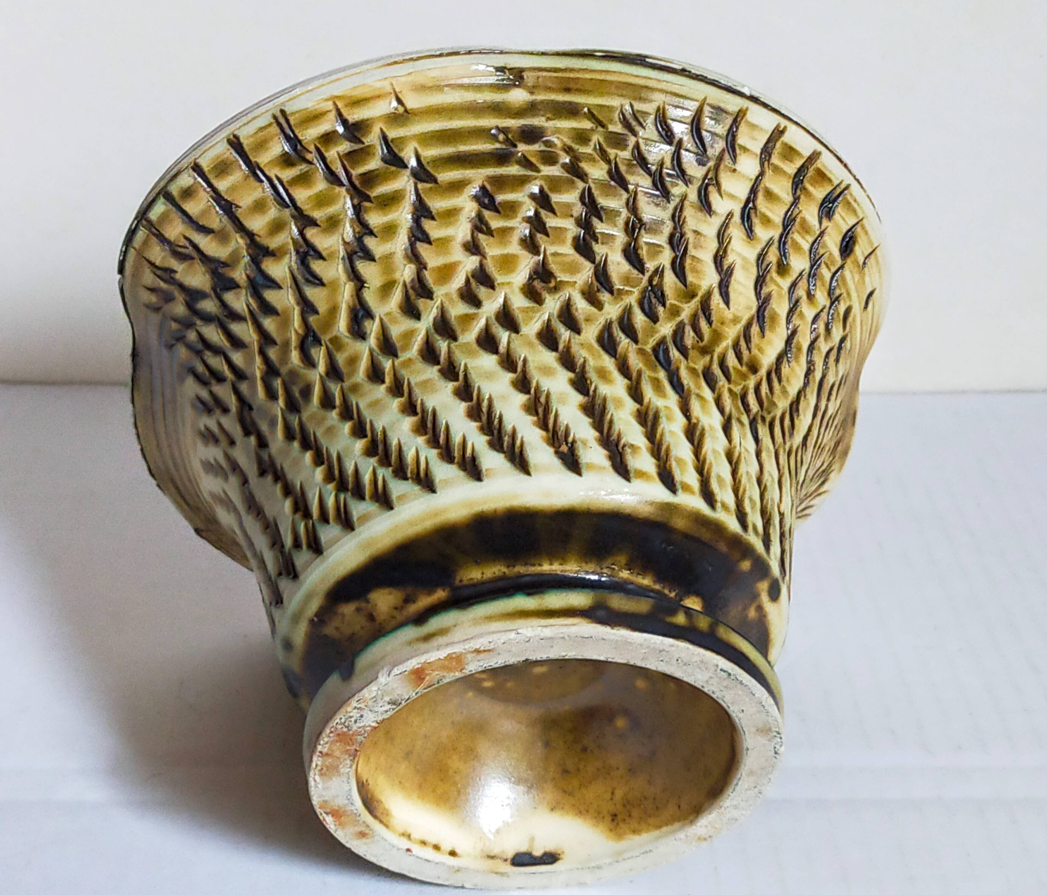 Ceramic planter with vintage scarifications from the 1950s