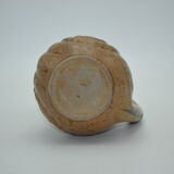 Sandstone pitcher decorated with coils