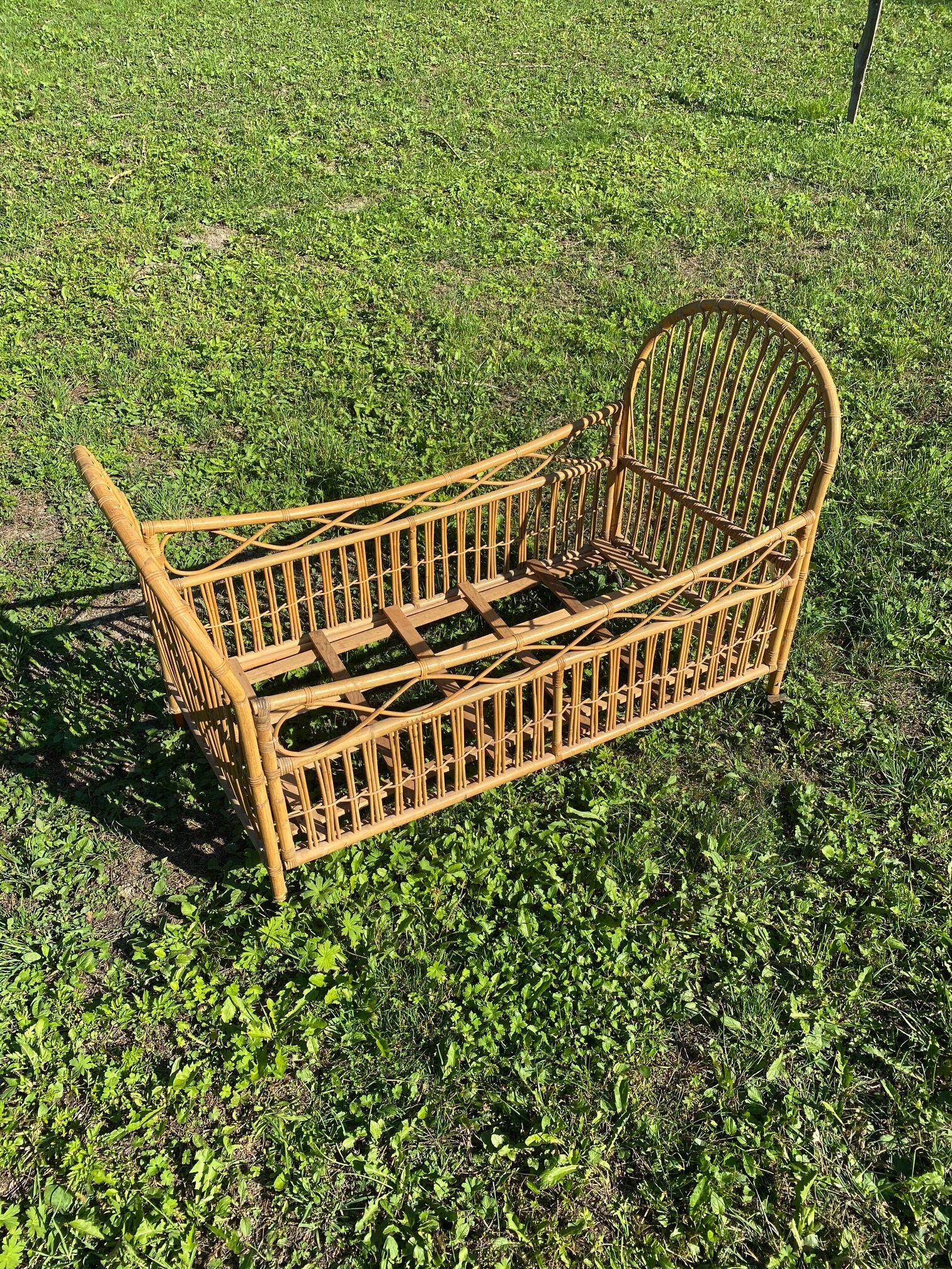 Children's bed in vintage rattan