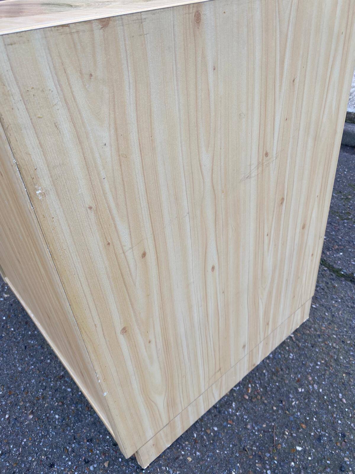 Scandinavian beige wooden chest of drawers