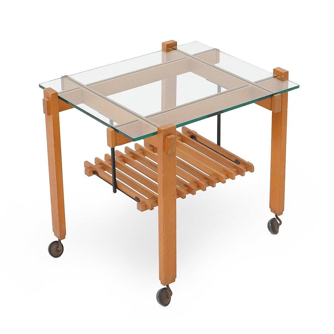 Wood and glass coffee table with wheels, 1960s.