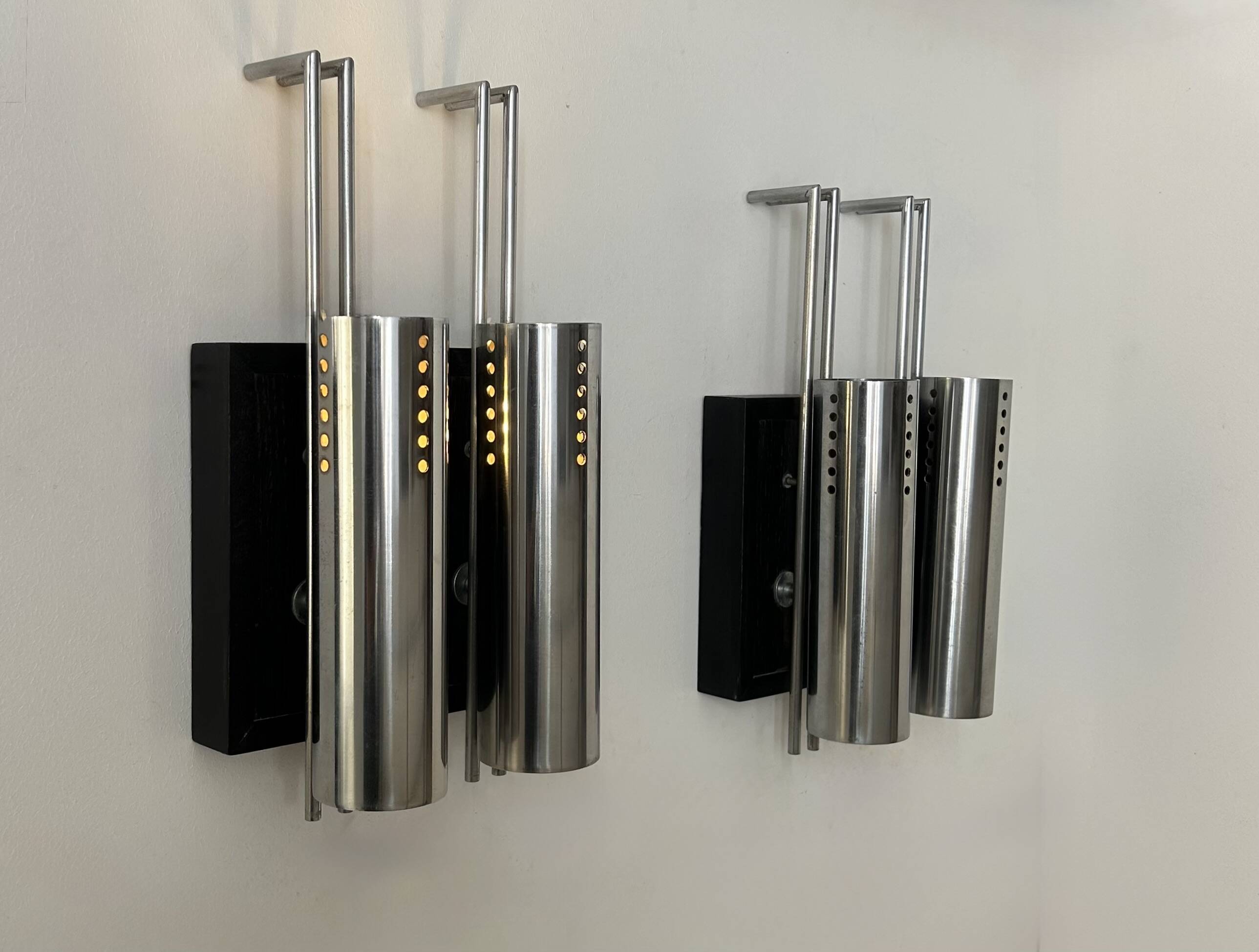 Pair of vintage wall lights, chrome-plated metal and blackened oak, France, 1970