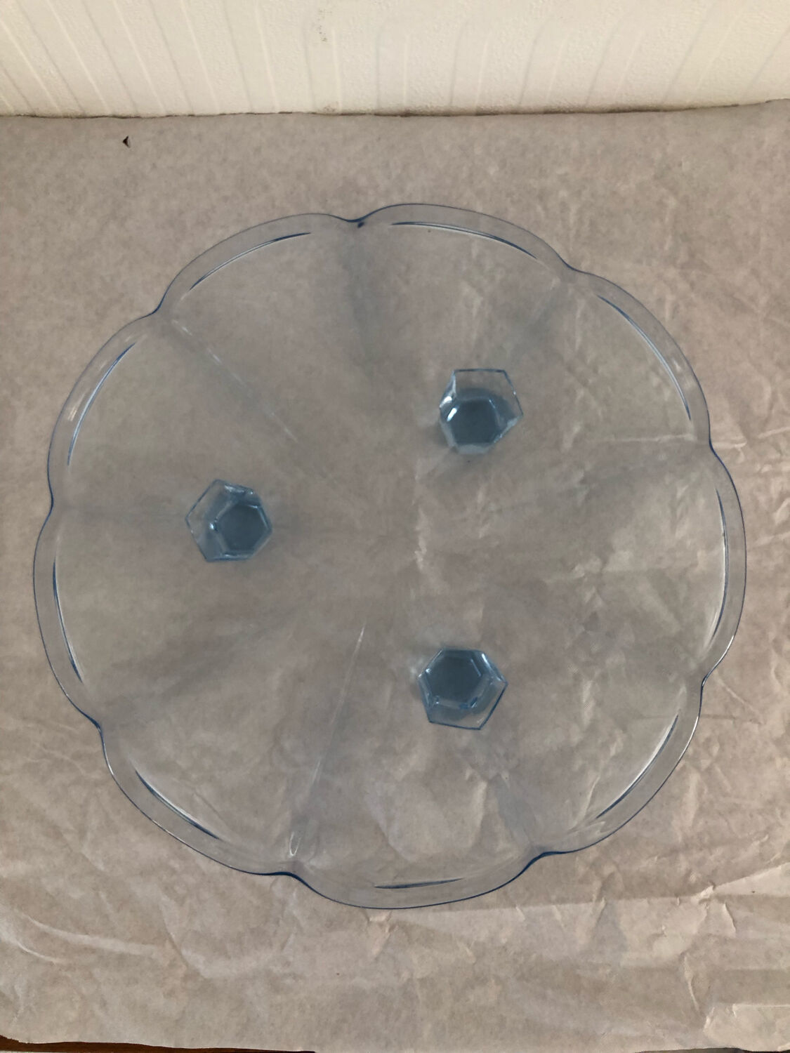 Blue transparent glass pie dish on vintage stand
