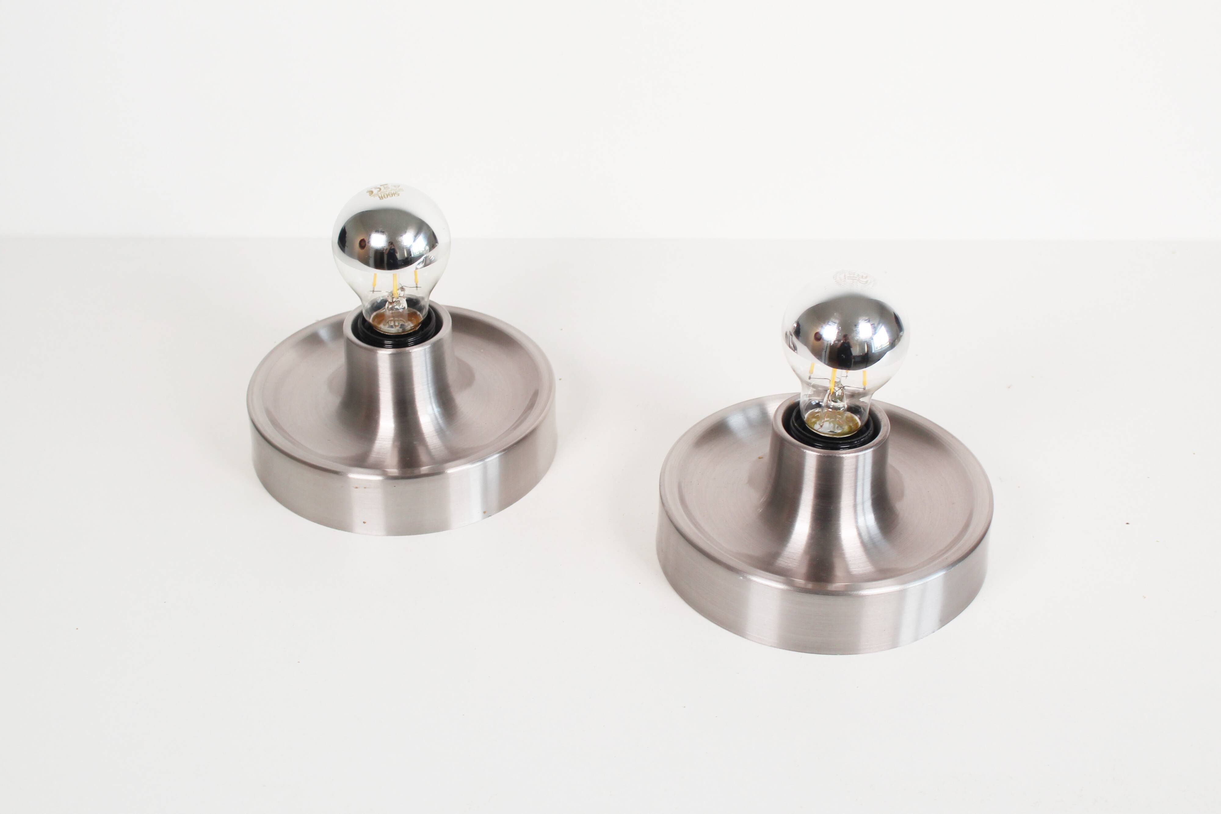 Pair of petite Disc sconces selected by Charlotte Perriand for Les Arcs