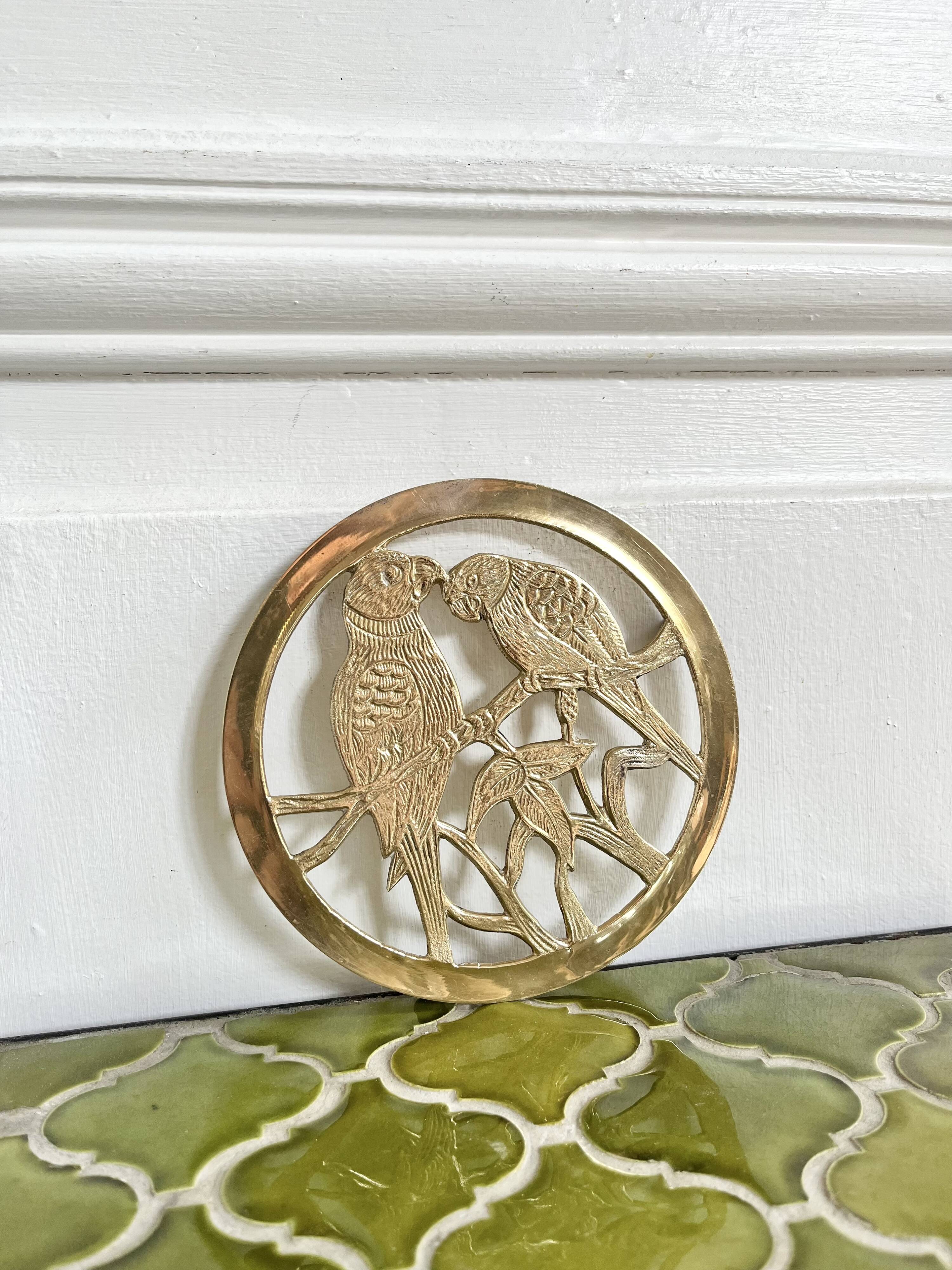 Small brass trivet with parrots or inseparable birds