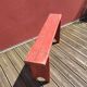 Banc ancien en bois peint en rouge