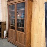 Old display case with bubbled glass