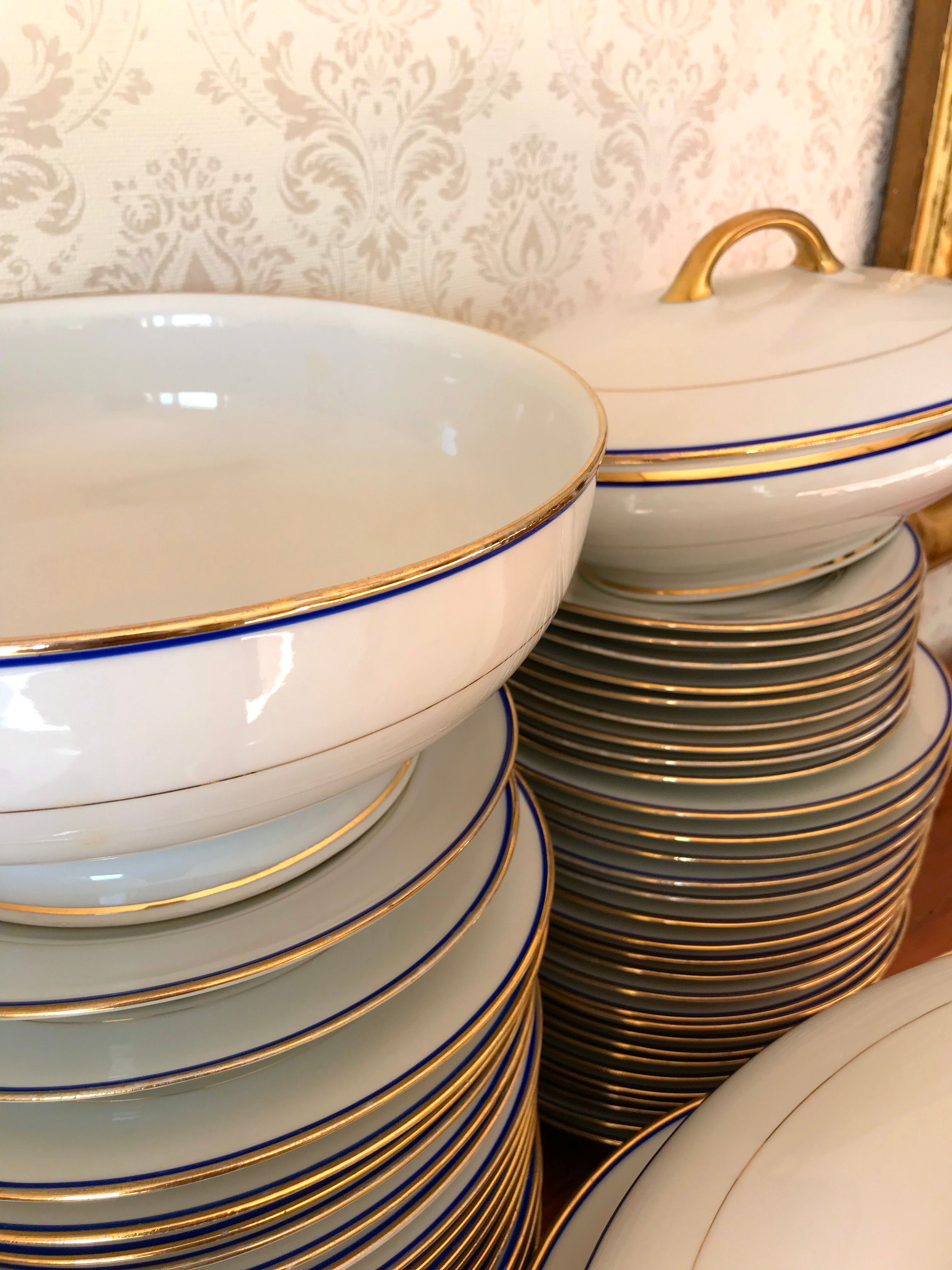 table service art deco limoges porcelain white border blue and gold 61 pieces signed