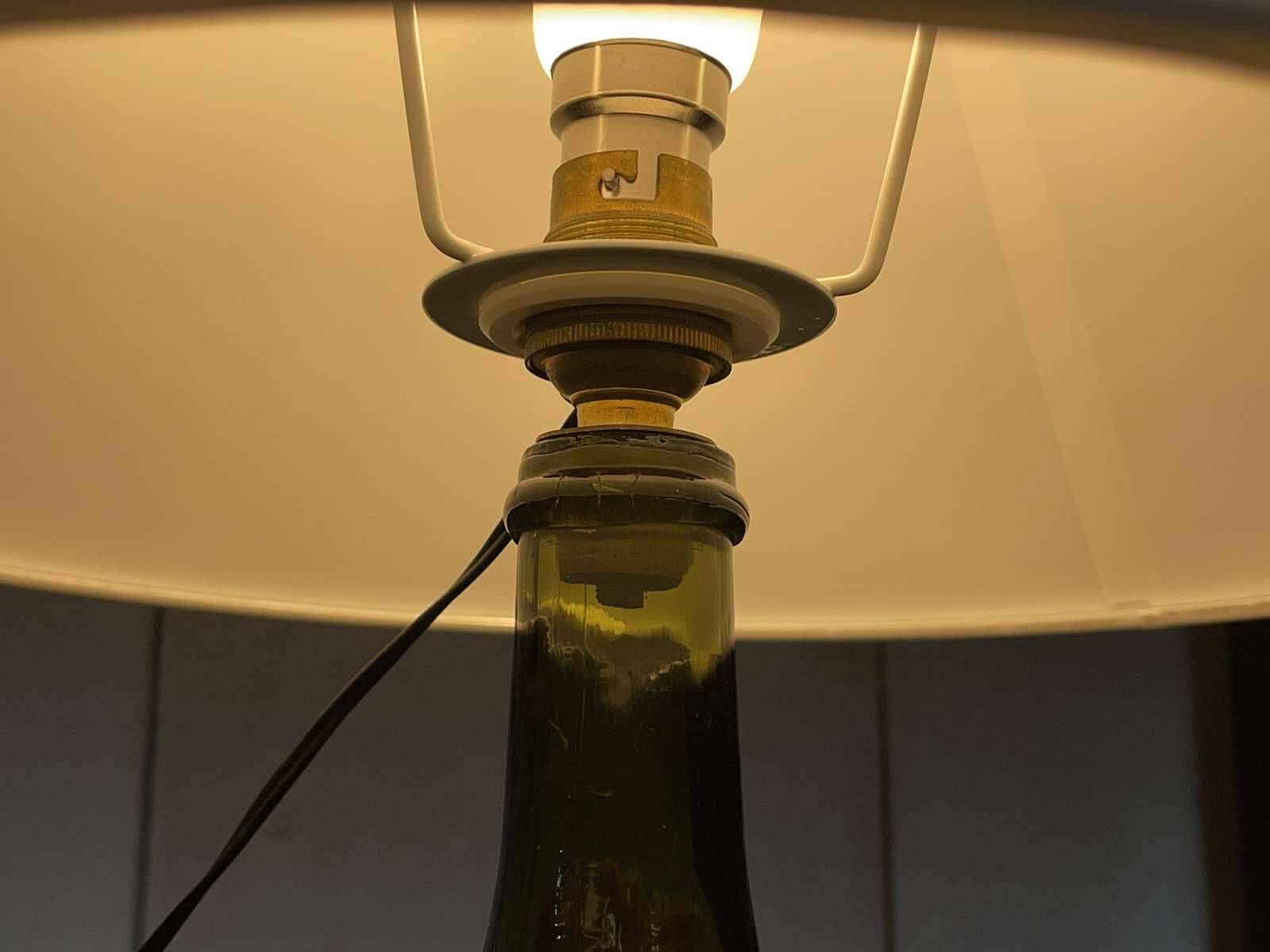 Blown glass lamp painted with a floral design, early 20th century.