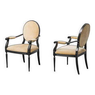 Pair of wooden and velvet armchairs in Louis XVI style