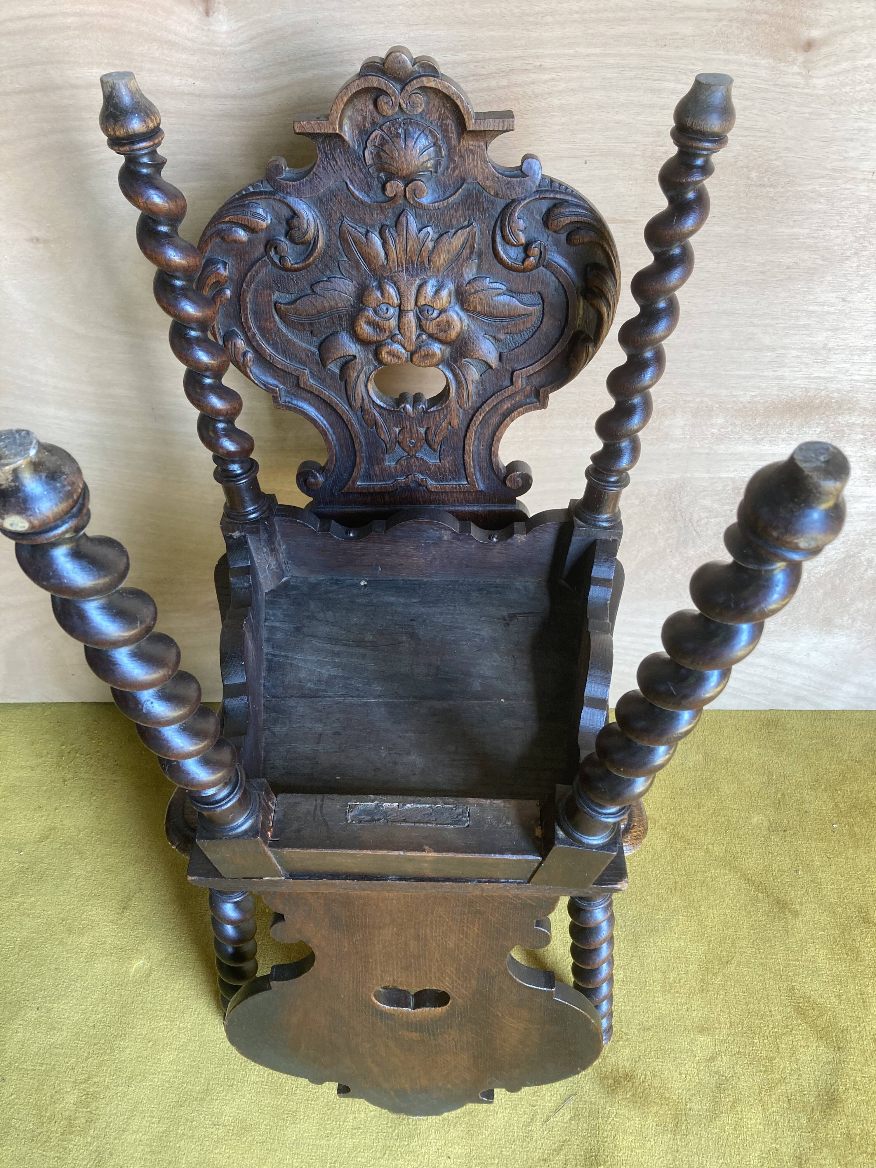 Duo of carved wooden chairs