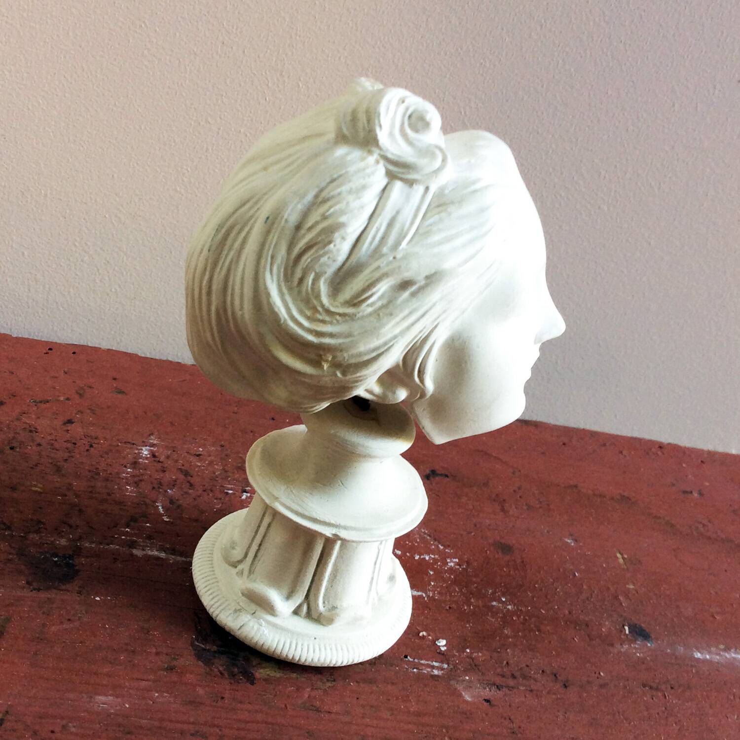 Plaster sculpture young woman with headband 1910