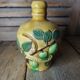 Calvados decanter in vintage antique ceramic