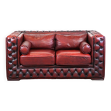 Beautiful red cowhide sleekly designed Chesterfield 2-seater sofa