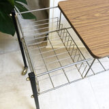 Vinyl door table with wheels, 1970