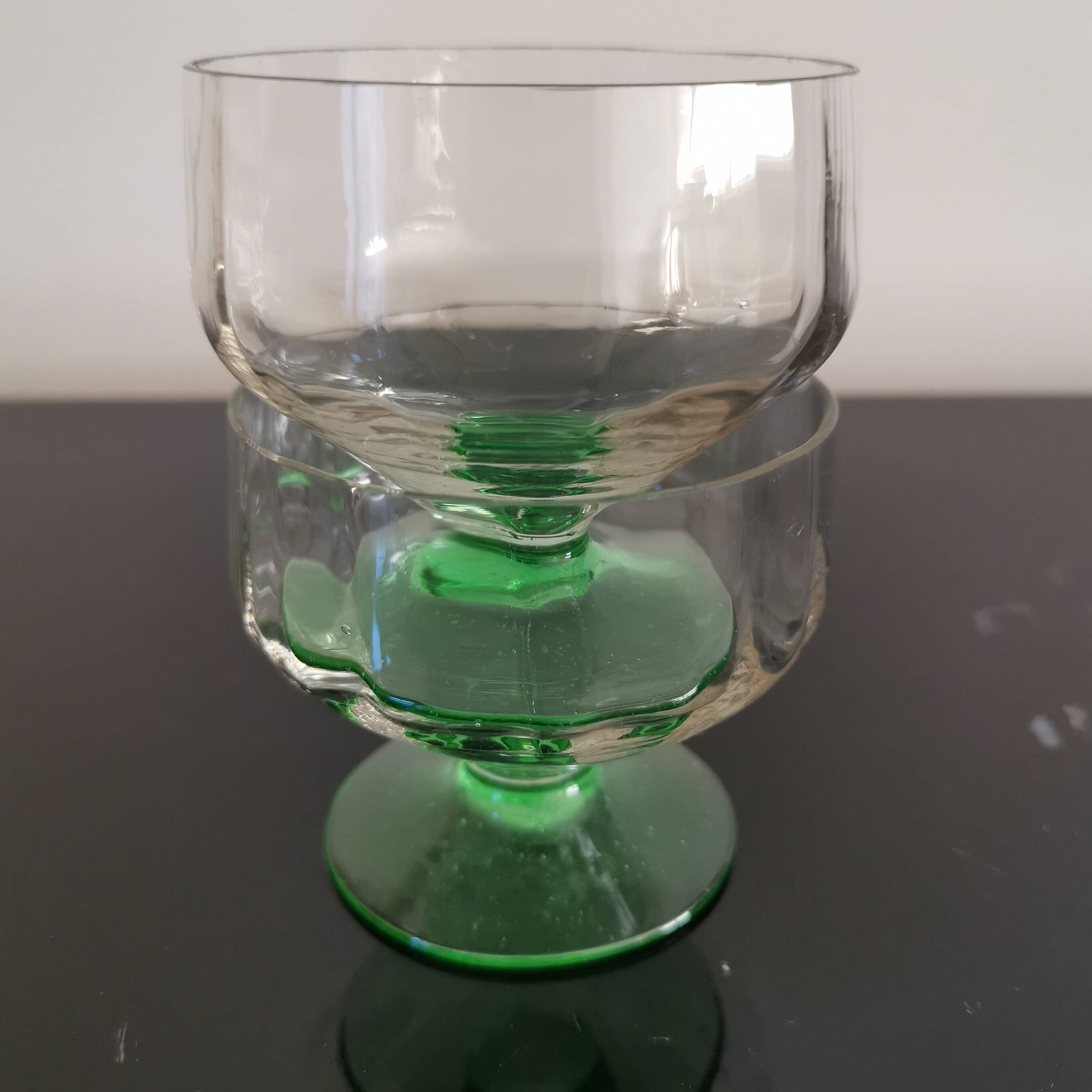 2 faceted champagne glasses with green feet, 1930s