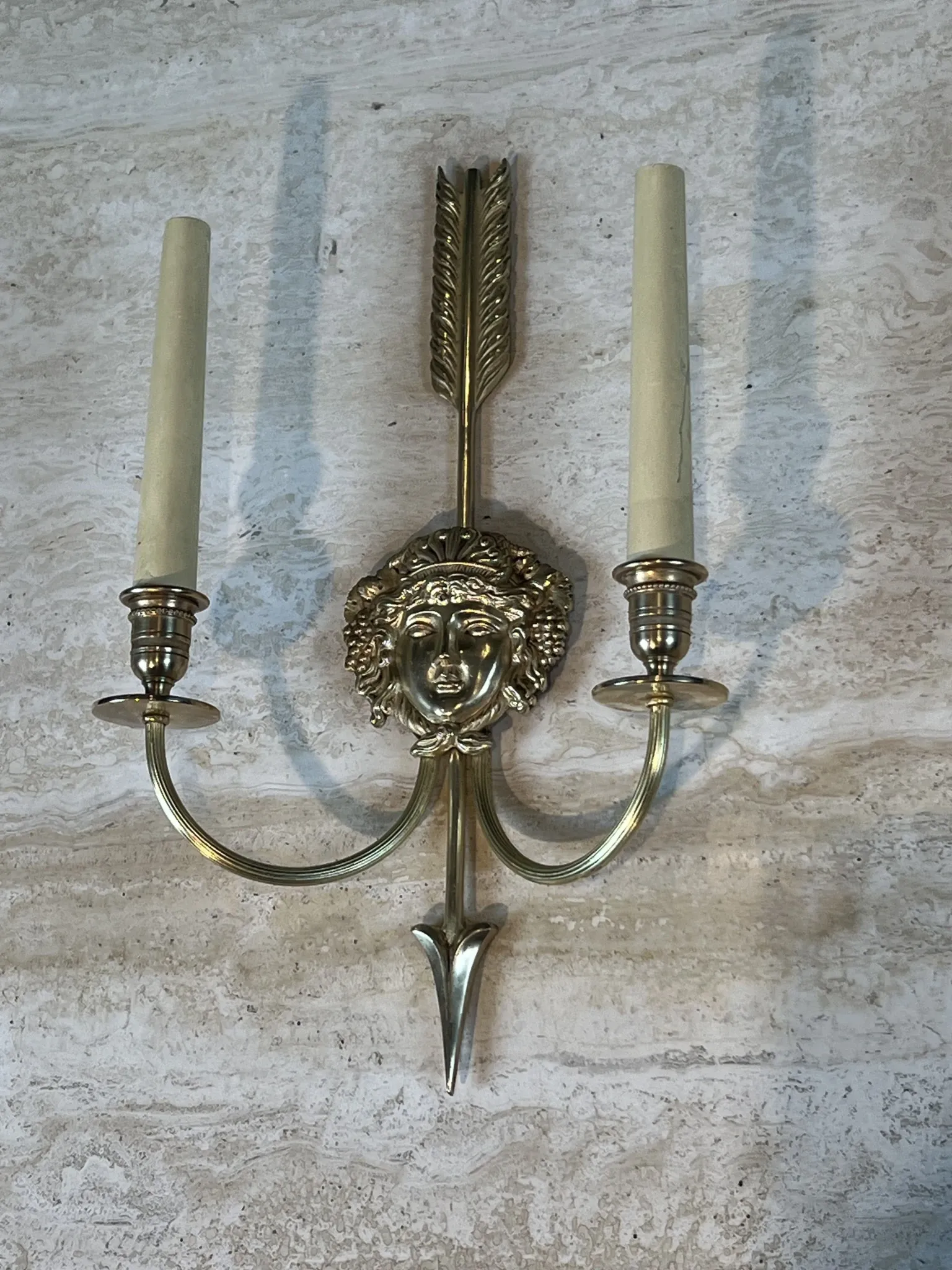 Pair of Two-Arm Bronze Wall Lights with Arrow and Mask Decoration