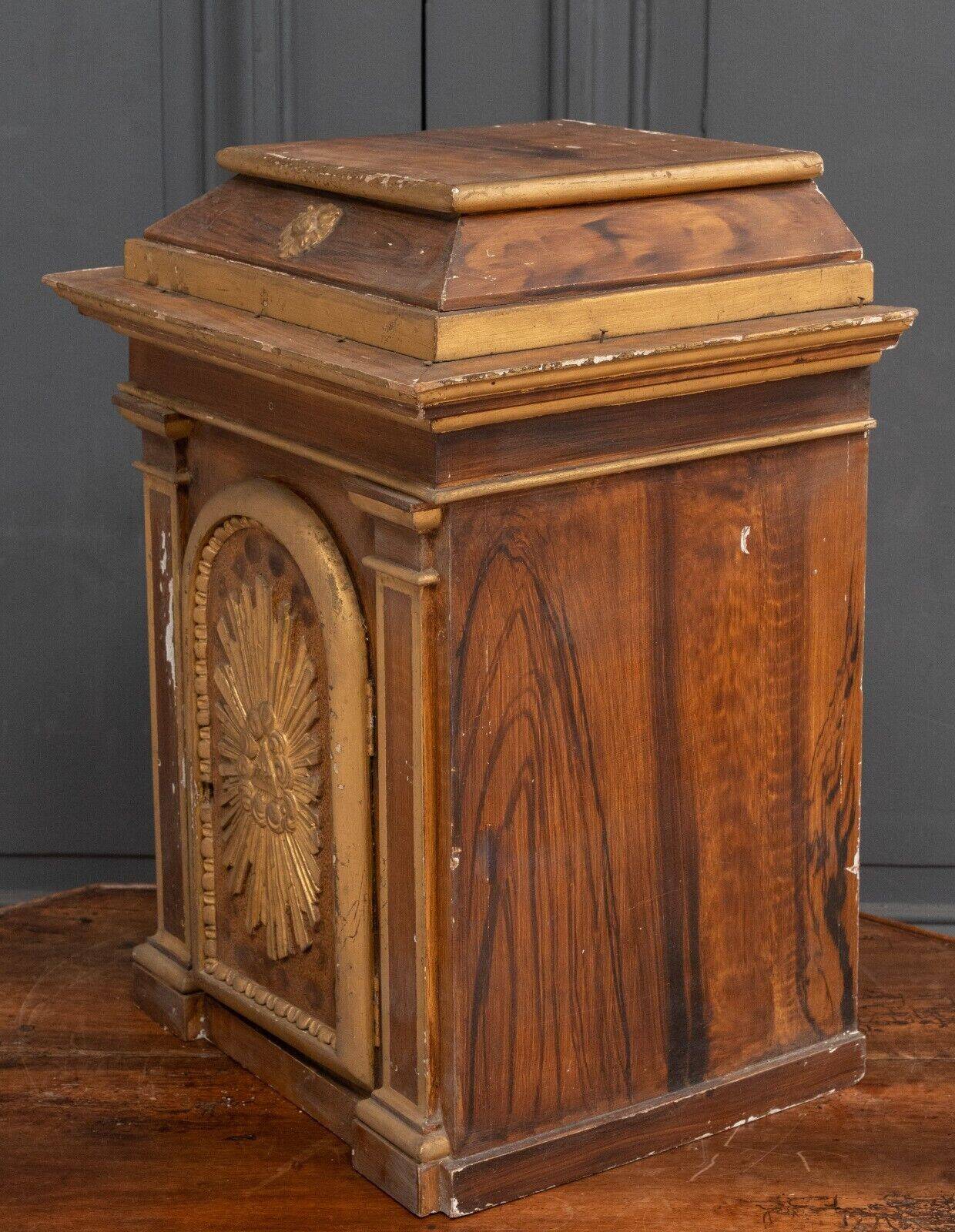 18th century tabernacle decorated with 2 columns and a sun on the facade