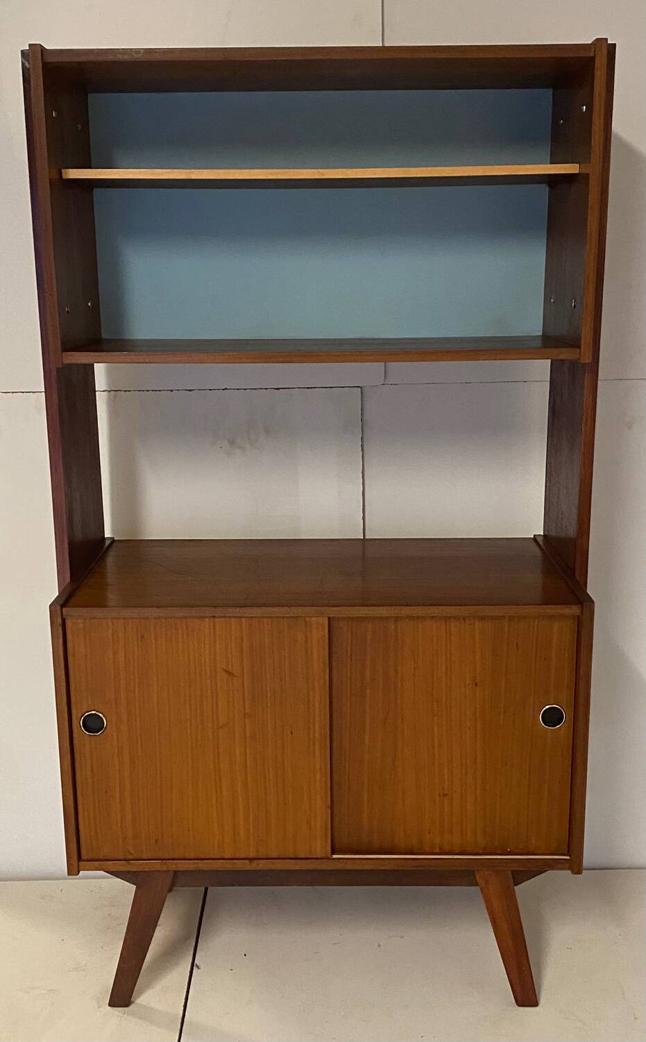 Vintage bookcase with compass feet from the 60s
