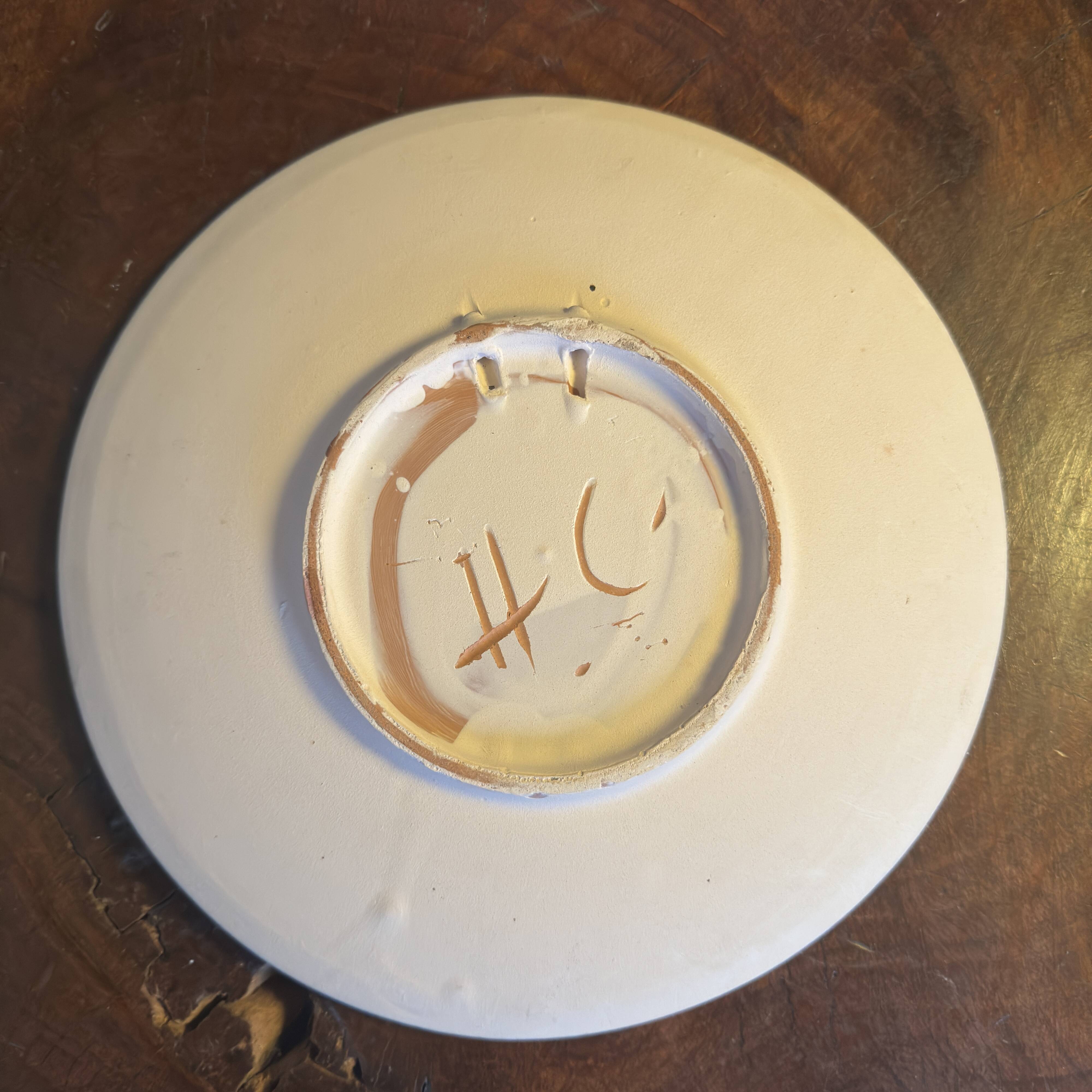 Vintage ceramic plate signed