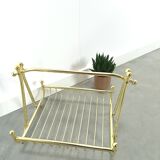 Gold magazine rack