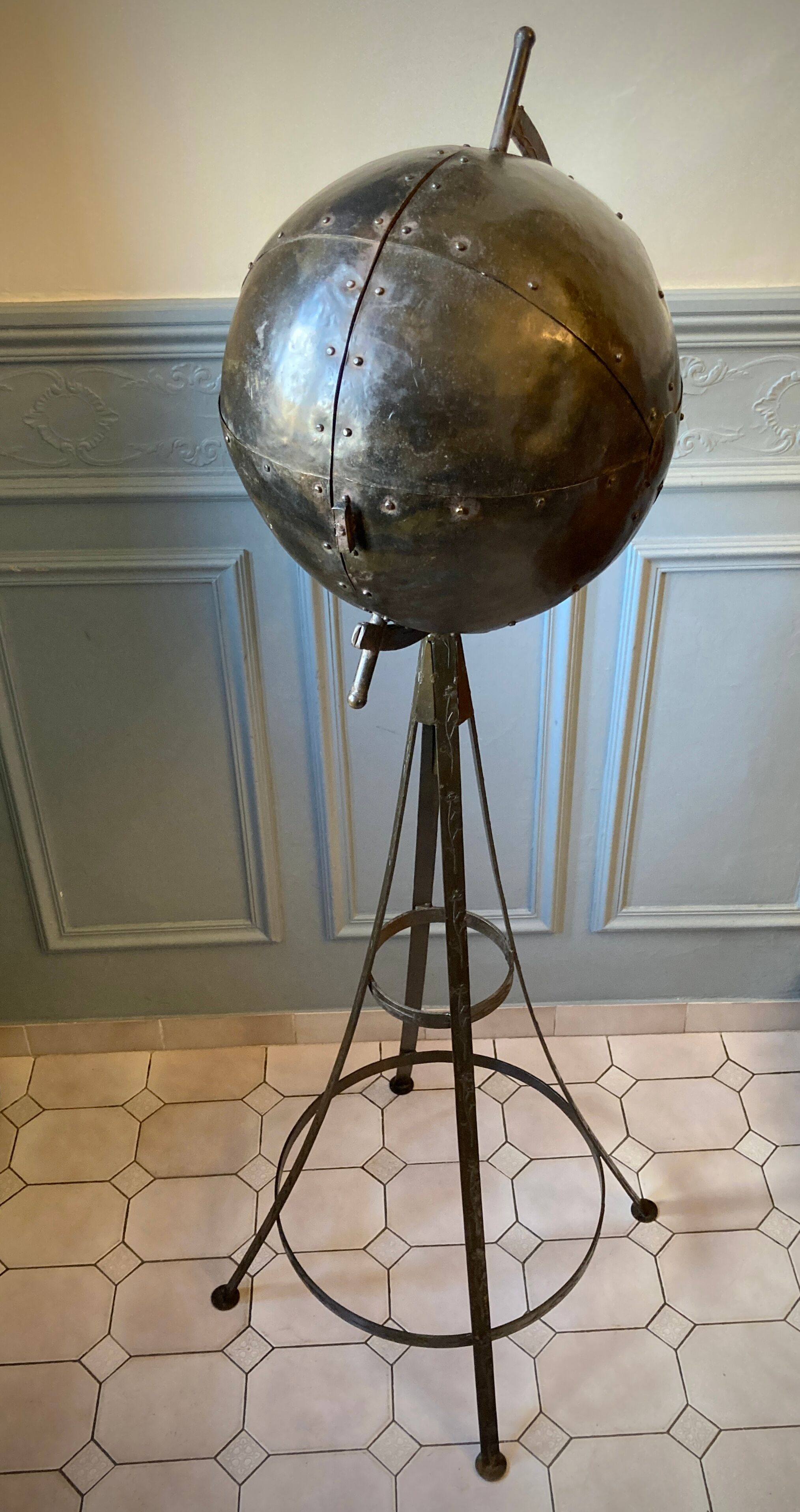 Atypical industrial furniture riveted sphere