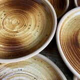 4 small stoneware plates