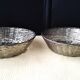 Pair of bread baskets, woven silver-plated wire baskets