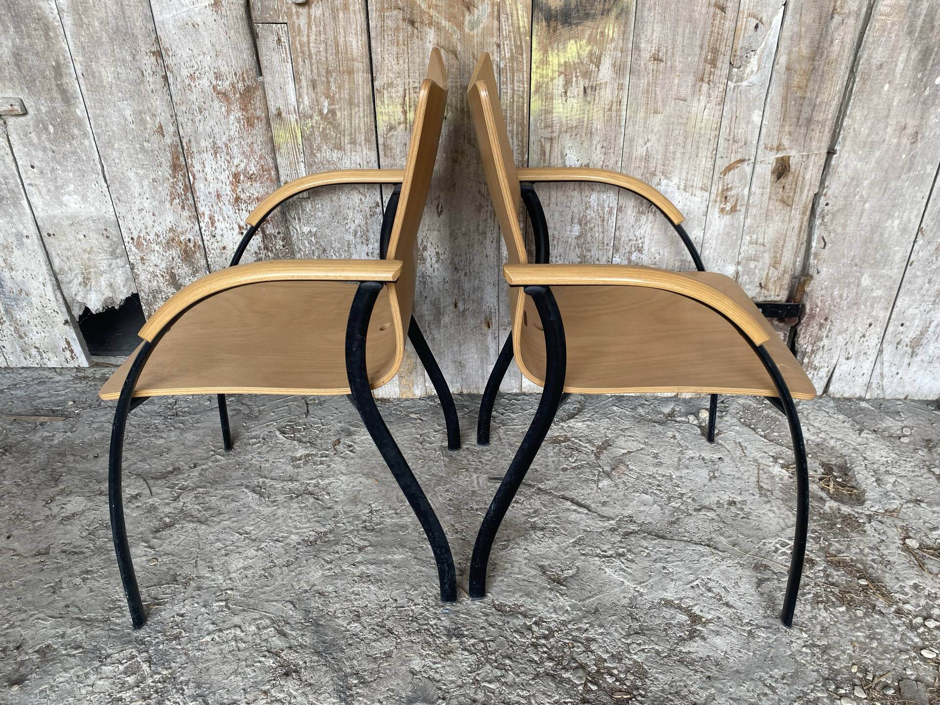 Pair of Vintage RONÉO Armchairs with Black Metal Legs + Curved Wooden Shell