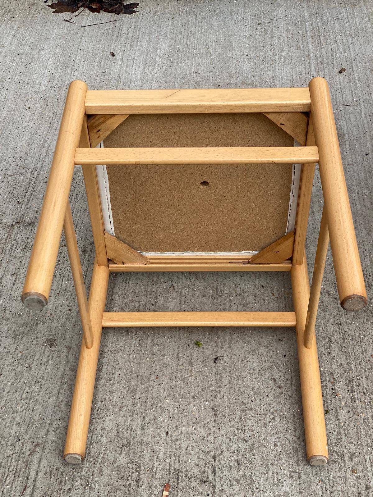 4 solid wood and white leather chairs