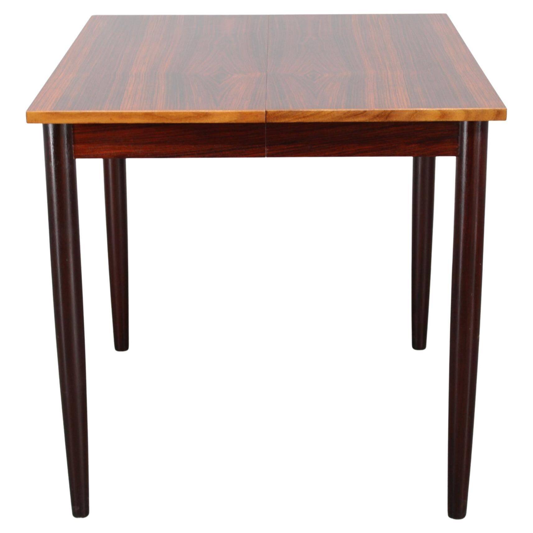 1960s Danish extendable palisander dining table, 4 leaves, restored