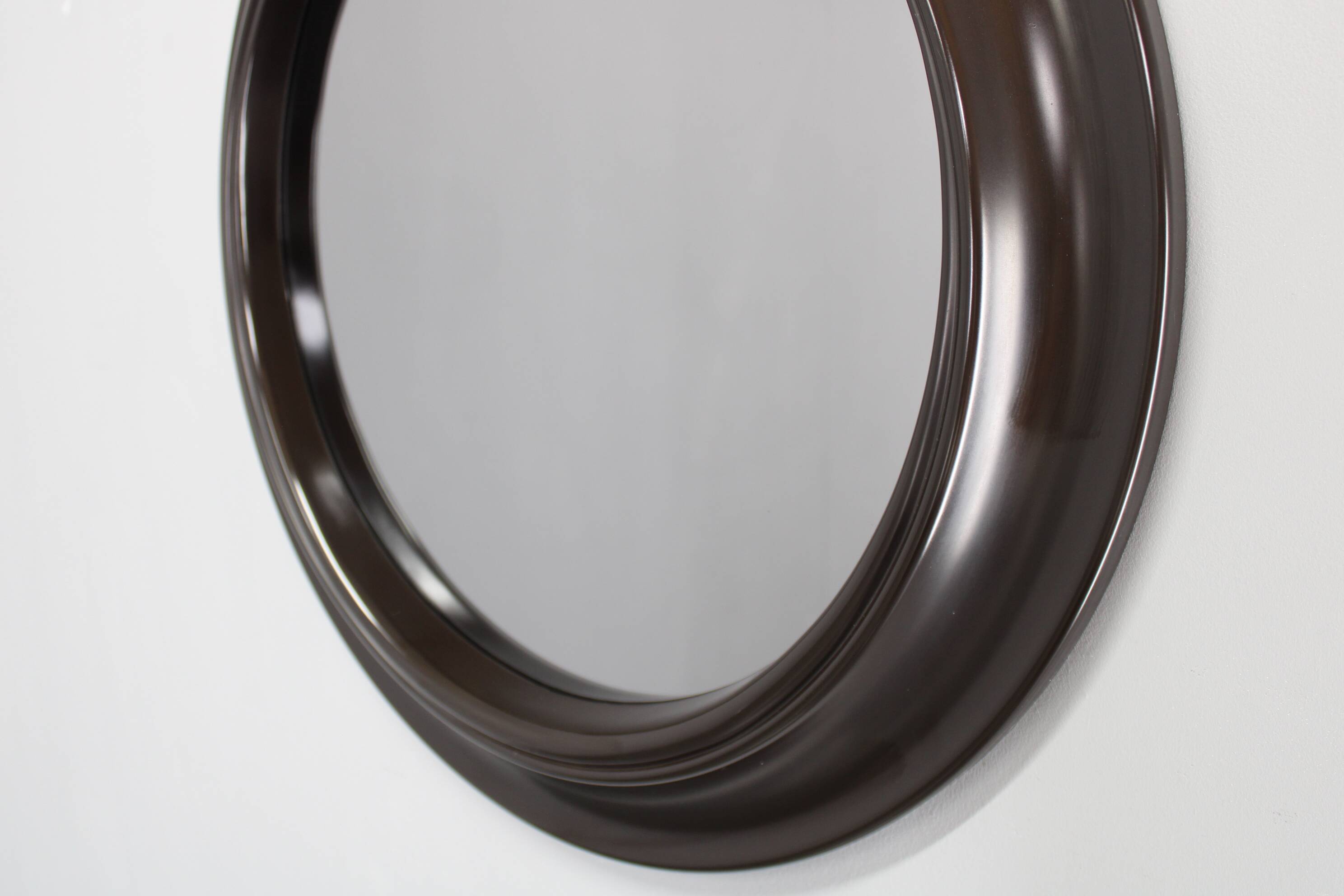 1970s Italian round mirror in dark brown plastic frame