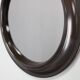 1970s Italian round mirror in dark brown plastic frame