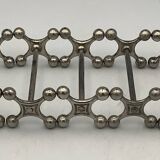 Set of 7 vintage knife rests in the shape of crosses in silver-plated metal.