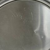 Large stainless steel serving platter with fish-shaped handles.