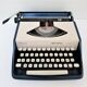 typewriter Remington Sperry rand Envoy III blue and white 70s