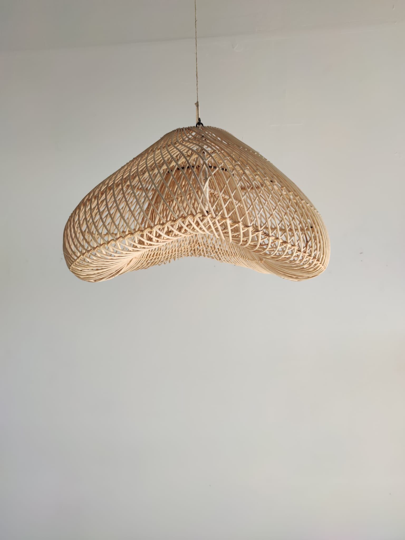 Small rattan lampshade in the shape of a braided hat