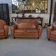 Ensemble 2 fauteuils club en simili cuir camel 1980’s