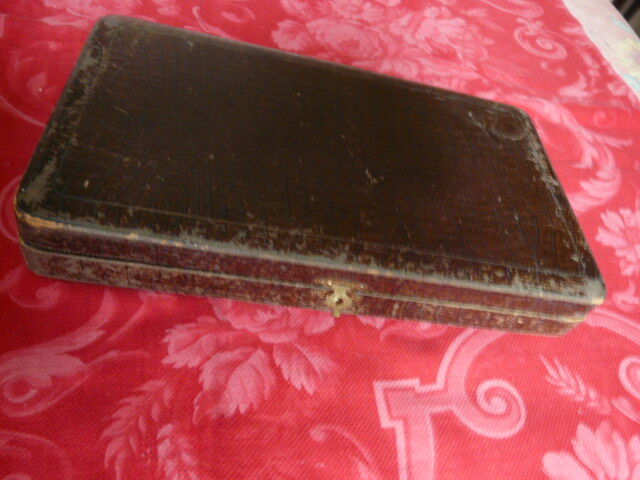 Series of 12 antique silver metal knives in their box