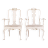 A pair of armchairs – neo rococo style – white painted with decorative details – 1920s