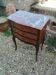 Antique marquetry commode with marble top in Louis XVI style.