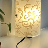 Polished and screen-printed glass sconce by eglo